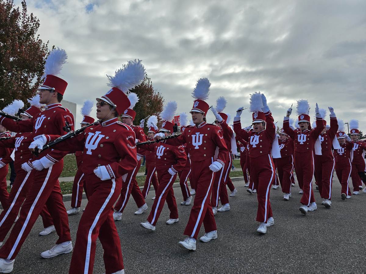 The Indiana University Marching Hundred band marching in formation before an IU football game