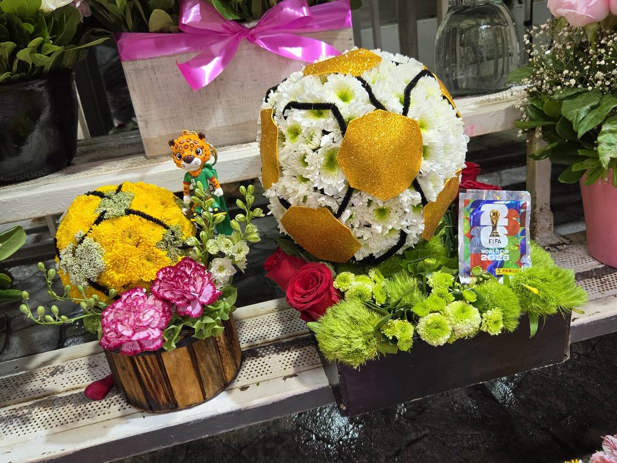 World Cup 2026 themed flower arrangements with a soccer ball made of flowers and a FIFA sticker
